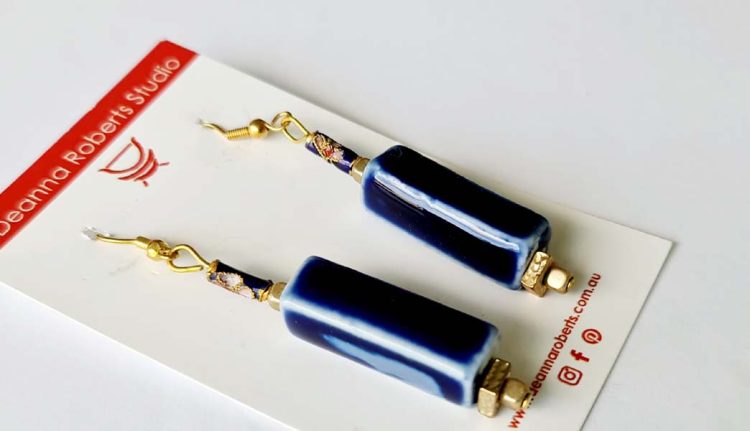 Midnight Blue Porcelain long bead earrings 5cm x .8cm with cloisonne bead, gold square bead at base and gold plated hooks destash.au