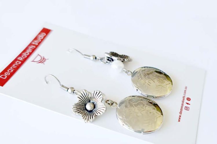 Silver Locket Earrings with flower and pearl bead and locket with flower impression 4cm x 2cm destash.au