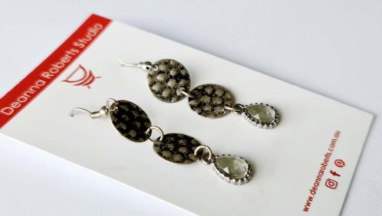 Spot Drop Earrings with 2 silver pressed discs and cut glass bordered teardrop 4cm x 1cm destash.au